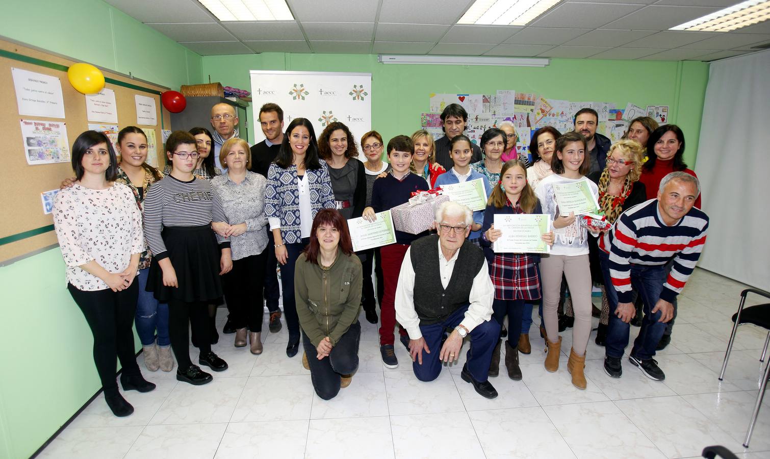 Entrega de premios del Concurso de Postales Navideñas de la AECC