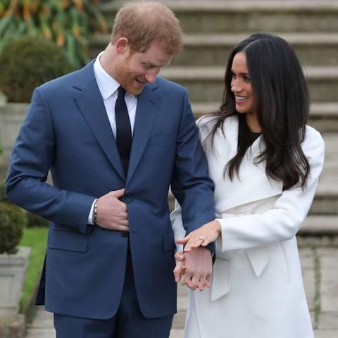 Meghan Markle (d) acompaña al príncipe Harry./Daniel LEAL-OLIVAS (AFP)