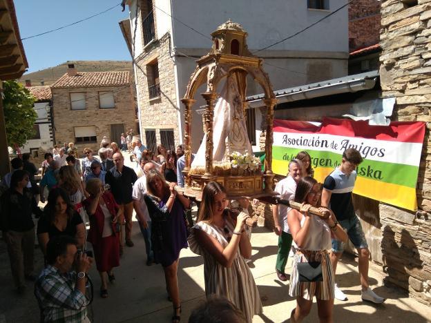 Procesión y subasta de los palos de la Virgen