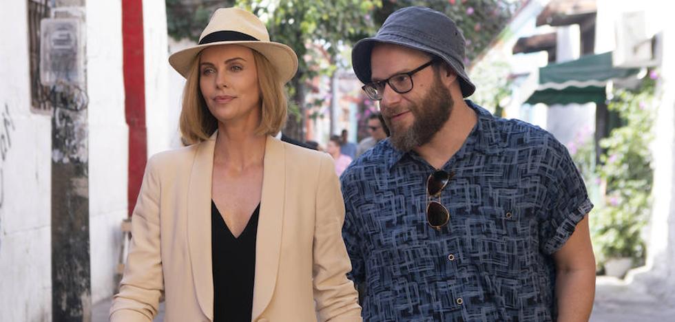 Seth Rogen aspira a la imperial Charlize Theron