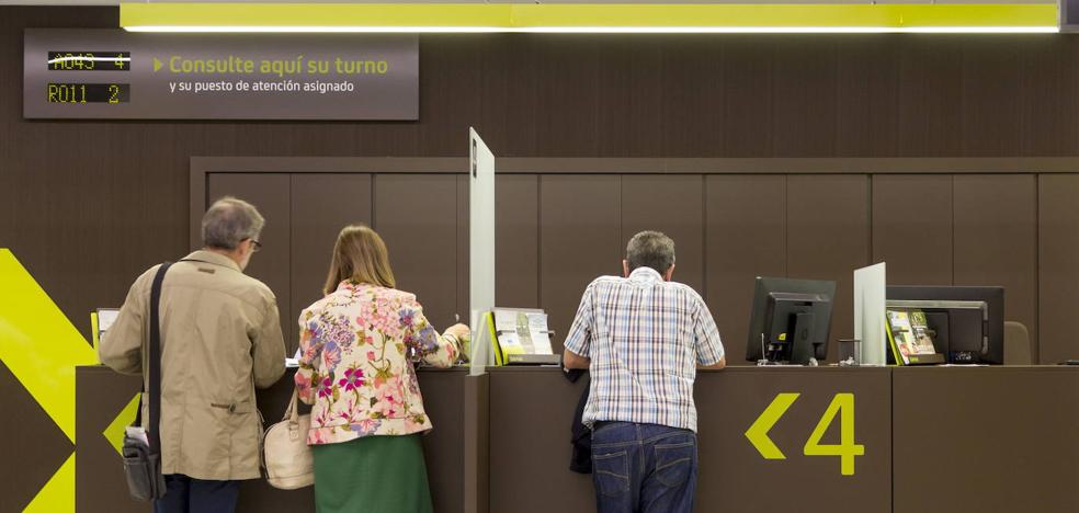 Los 51.000 empleados de CaixaBank y Bankia contienen la respiración por la fusión