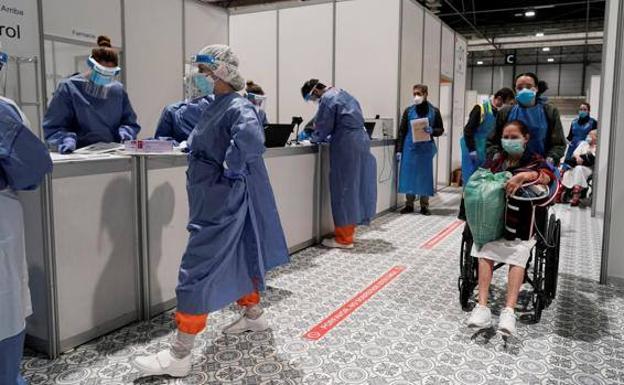 Madrid estudia reabrir el hospital de Ifema ante la avalancha de casos