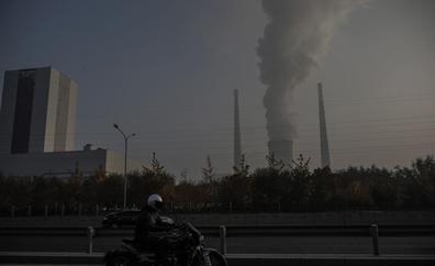 China, entre la espada y la pared del crecimiento y la contaminación