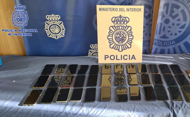 Detenidos dos hombres por robar 52 móviles el día del cohete