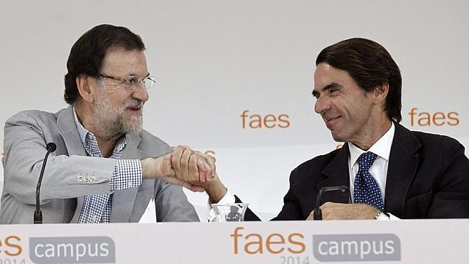 Rajoy y Aznar escenifican una fría reconciliación